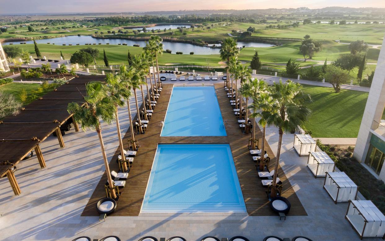 The Anantara Algarve Vilamoura resort with family pools overlooking the golf course
