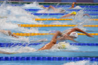 Swimmers race in their heat of the men's 200-meter freestyle at the 2020 Summer Olympics, Sunday, July 25, 2021, in Tokyo, Japan. (AP Photo/Matthias Schrader)