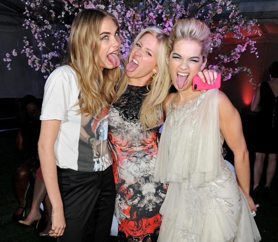 Iconic: Cara Delevingne with Ellie Goulding and Rita Ora at the Glamour Women of the Year Awards (Dave Benett)