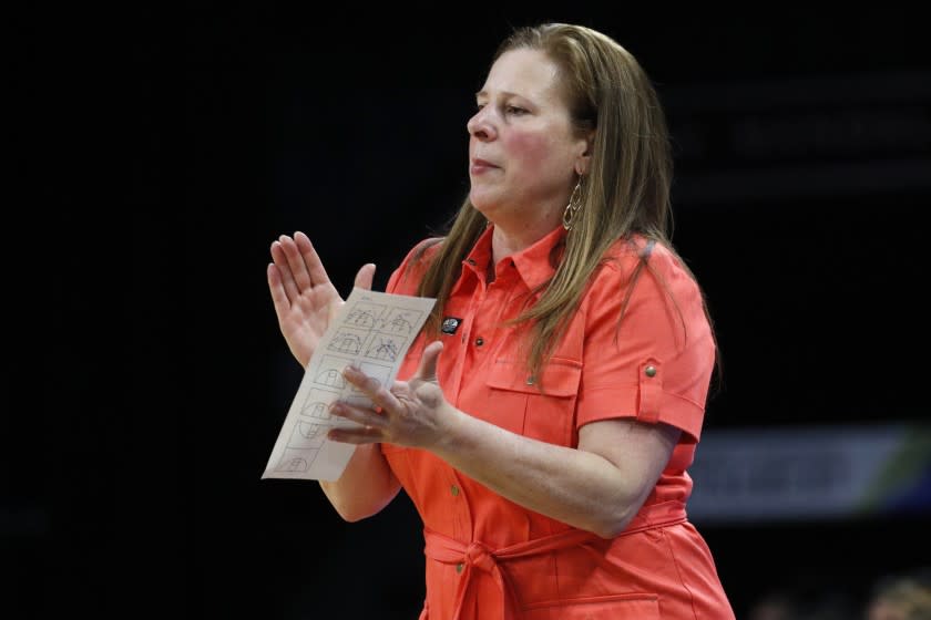 UCLA coach Cori Close encourages her players during a game against USC in the Pac-12 women's tournament March 6, 2020.