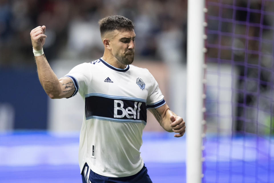 Vancouver Whitecaps' Lucas Cavallini celebrates his goal against the Chicago Fire during the second half of an MLS soccer match Saturday, July 23, 2022, in Vancouver, British Columbia. (Darryl Dyck/The Canadian Press via AP)