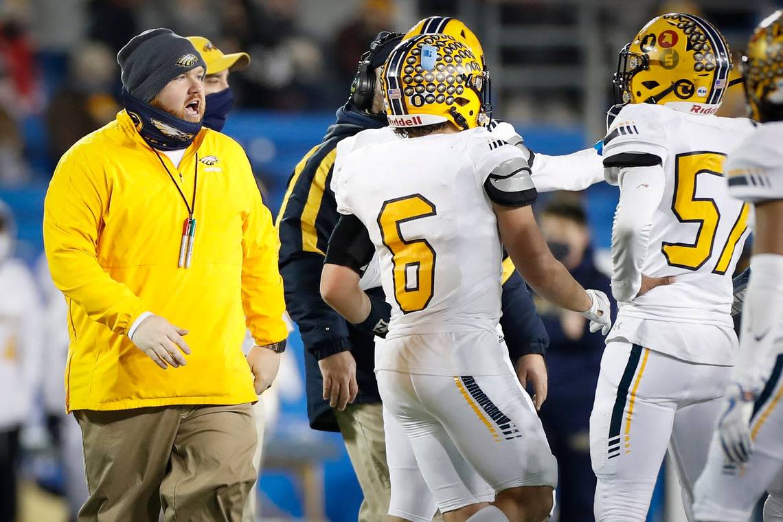 Franklin County head coach Eddie James instructs his players during the Class 4A state championship game against Boyle County at Kroger Field in Lexington in 2020.