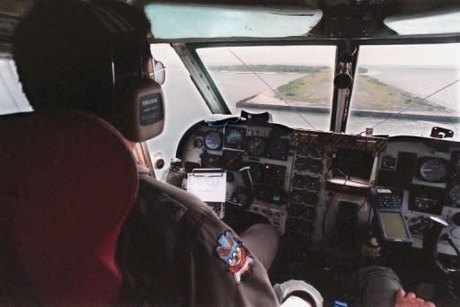 File photo shows Philippine Air Force personnel preparing to land a reconaissance aircraft in the Philippine-occupied Spratly islands. The Philippines said Thursday it had lodged a formal protest at the United Nations over China's claims to the disputed island network and adjacent South China Sea waters