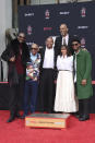 Snoop Dogg, from left, Quincy Jones, Dr Dre, Kareem Abdul-Jabbar, Rashida Jones and Usher attend a hand and footprint ceremony honouring Quincy Jones at the TCL Chinese Theatre (Richard Shotwell/Invision/AP)