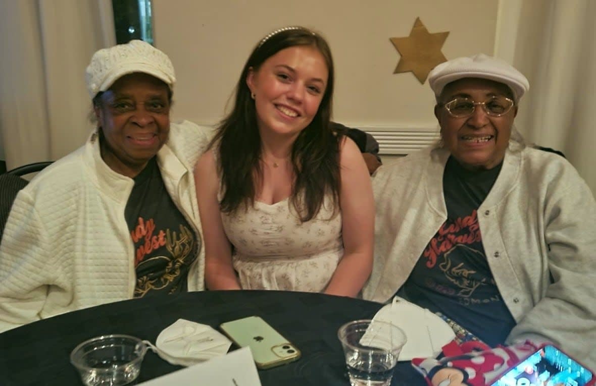 Rylee Chalifoux, centre, started swing dancing when she was nine years old. Now 14, she loves meeting original Lindy Hoppers like Barbara Billups, left, and Sugar Sullivan. (Submitted by Rylee Chalifoux - image credit)