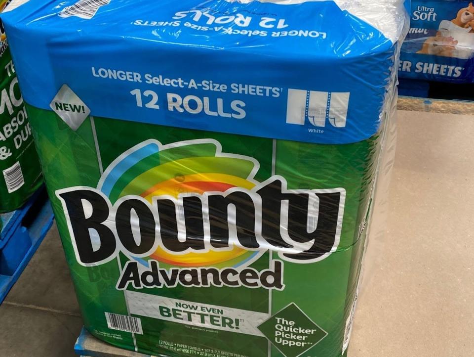 stacked packages of bulk bounty paper towels at costco