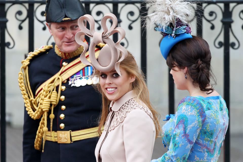 While many royal family watchers are most concerned with what Meghan Markle's wedding dress will look like, others are wondering about Princess Beatrice's hat.