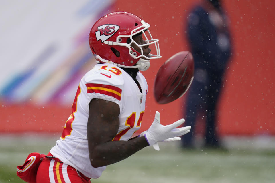 Kansas City Chiefs kick returner Byron Pringle catches a kickoff before running it back for a touchdown during the first half of an NFL football game against the Denver Broncos, Sunday, Oct. 25, 2020, in Denver. (AP Photo/David Zalubowski)