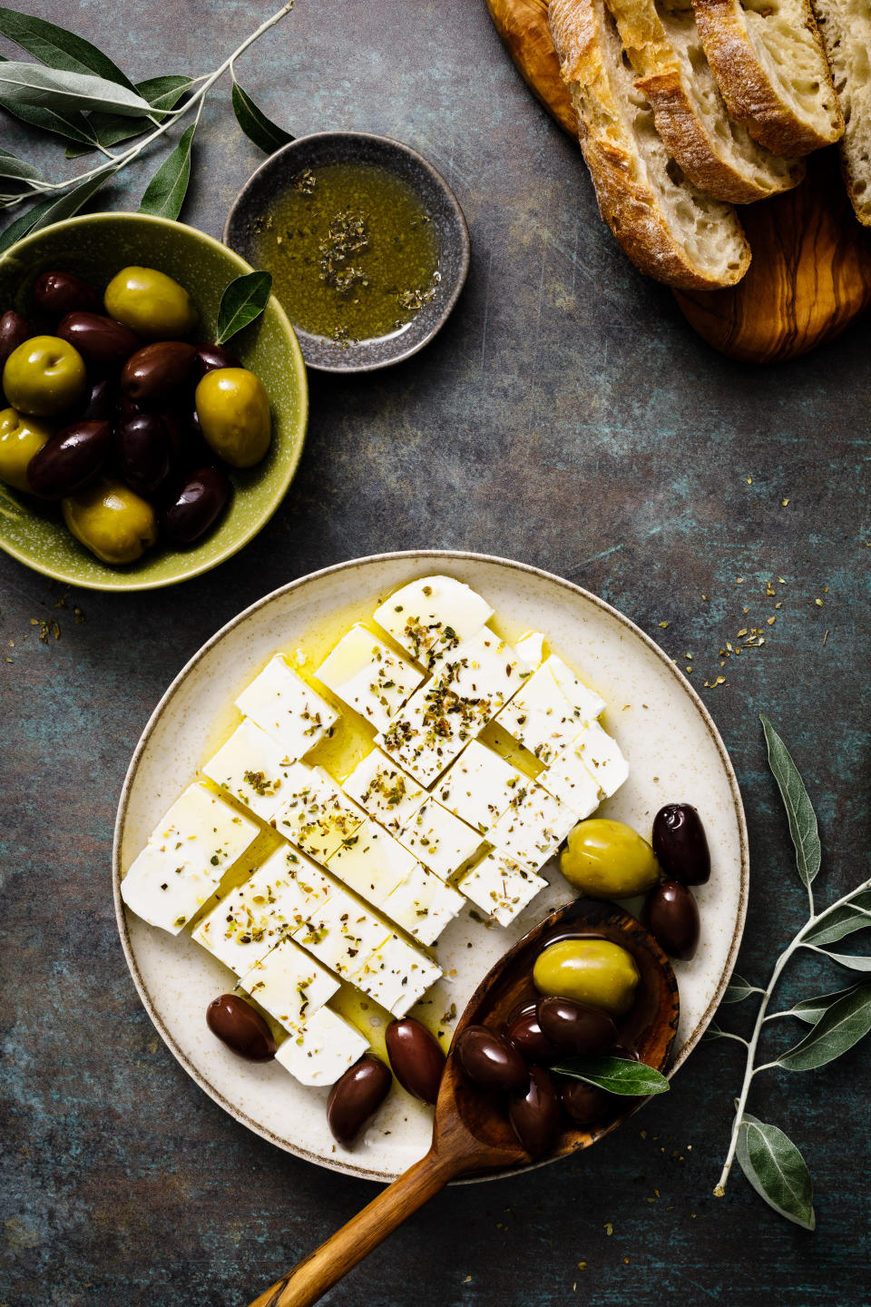 Feta cheese, olives and ciabatta, top view