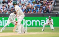 India captured Australia's last two wickets after a rain-delayed start to day five of the third Test on Sunday to complete an emphatic 137-run win and take a 2-1 series lead into the Sydney finale.
