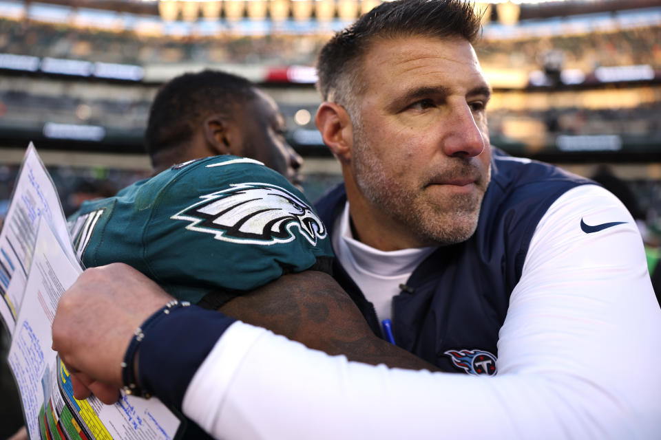 PHILADELPHIA, PENNSYLVANIA – DECEMBER 04: A.J. Brown #11 of the Philadelphia Eagles hugs head coach Mike Vrabel of the Tennessee Titans after the game at Lincoln Financial Field on December 04, 2022 in Philadelphia, Pennsylvania. (Photo by Scott Taetsch/Getty Images)