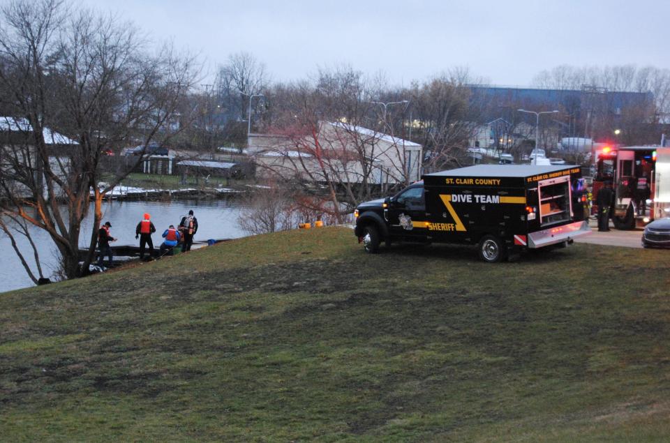 A woman and three children were hospitalized after a vehicle they were in became submerged in the Black River on Tuesday, Nov. 30, 2021, just west of the 10th Street Bridge.