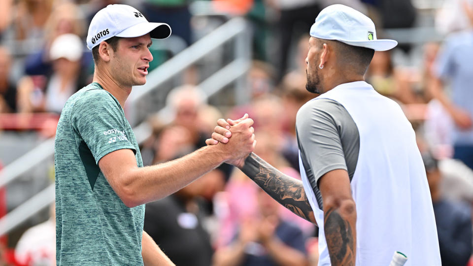 Hubert Hurkacz and Nick Kyrgios shake hands after their match at the Montreal Masters.