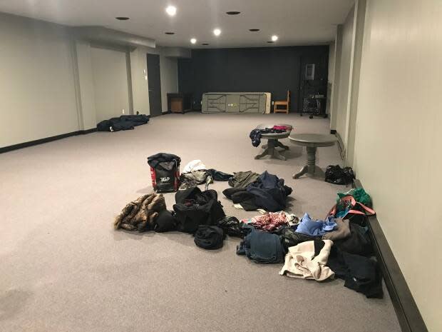 A small donation pile has started in the hotel's basement for anyone needing fresh clothes after the flood. 