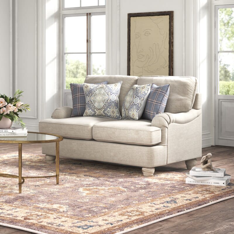 Cantata 66" Round Arm Loveseat. Image via Wayfair.