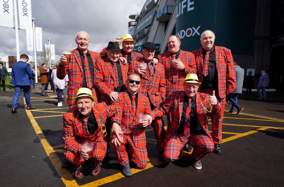 Racegoers wearing matching outfits at Aintree (David Davies/PA) (PA Wire)