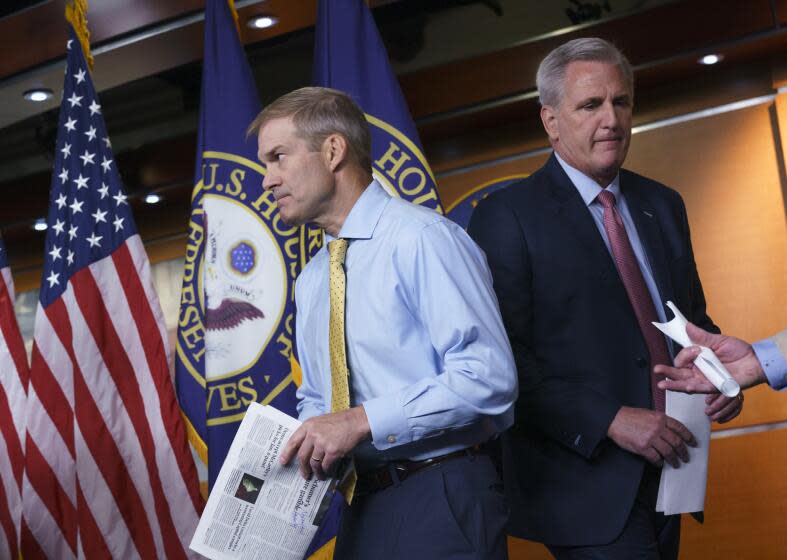 FILE - Rep. Jim Jordan, R-Ohio, left, and House Minority Leader Kevin McCarthy, R-Calif., exchange places at the microphones during a news conference after House Speaker Nancy Pelosi rejected two of McCarthy's picks for the committee investigating the Jan. 6 Capitol insurrection, at the Capitol in Washington, on July 21, 2021. Jordan, now the House Judiciary Committee chairman and the longtime Republican stalwart, has emerged as a top contender to replace former House Speaker Kevin McCarthy who was voted out of the job by a contingent of hard-right conservatives on Oct. 3, 2023. (AP Photo/J. Scott Applewhite, File)