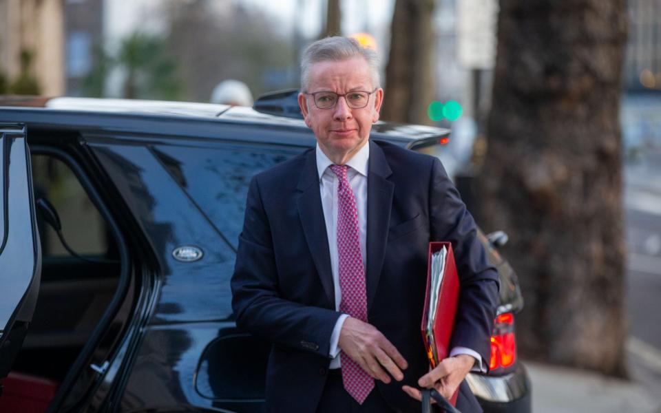 Michael Gove, the Housing Secretary, is pictured this morning in Westminster