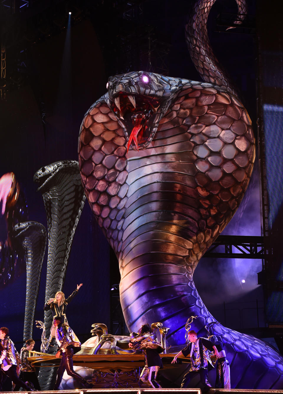 Taylor Swift performs next to a giant snake during opening night of her 2018 Reputation Stadium Tour. Source: Getty