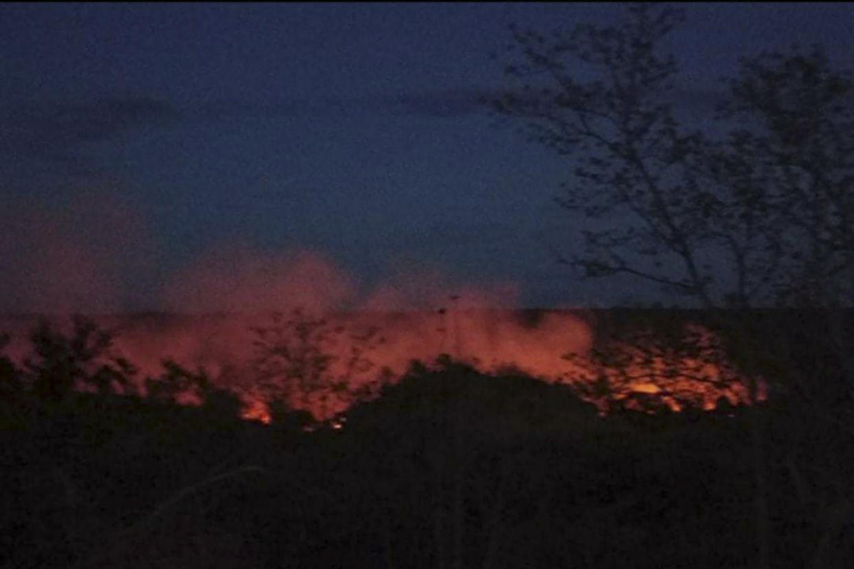 Das Dorf Kin Ma ist fast vollständig verbrannt (Bild: AP Photo)