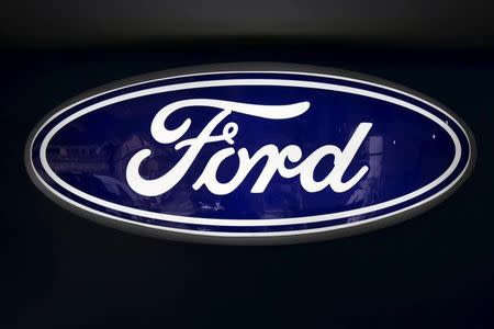 The corporate logo of Ford is seen at a Ford branch in Caracas March 27, 2015. REUTERS/Carlos Garcia Rawlins