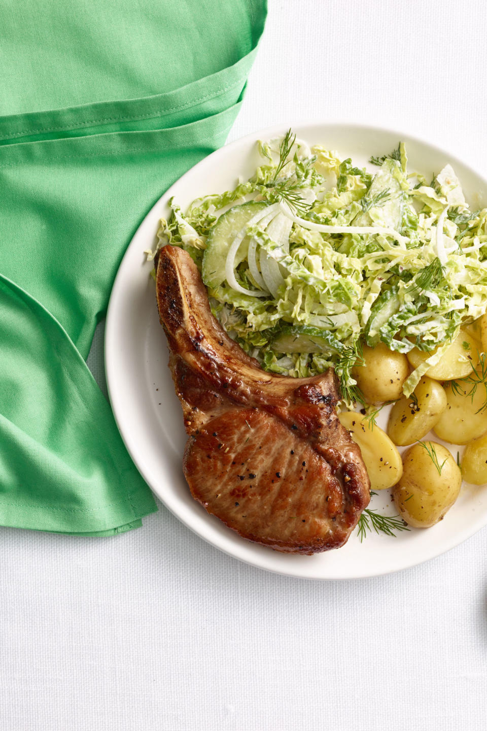 Pork Chops with Horseradish Cabbage and Cucumber Slaw