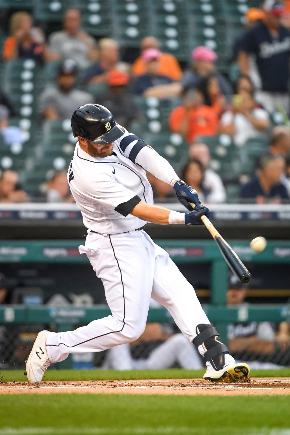 Robbie Grossman #8 of the Detroit Tigers hits a solo home run against the Oakland Athletics during the bottom of the first inning at Comerica Park on August 31, 2021 in Detroit, Michigan.