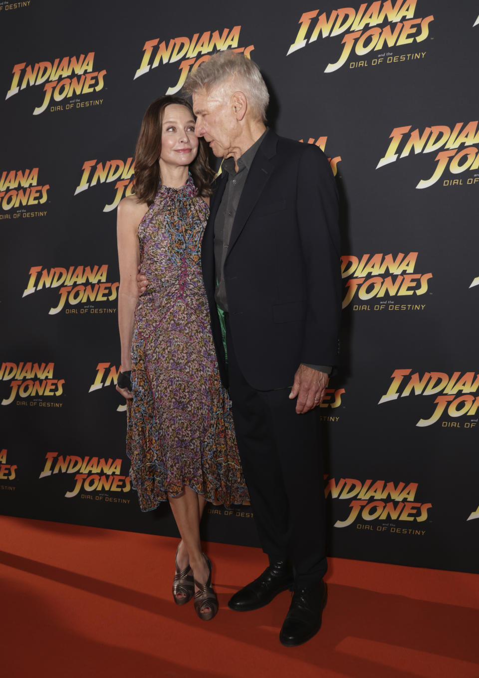 Calista Flockhart, left, and Harrison Ford pose for photographers upon arrival for the 'Indiana Jones and the Dial of Destiny' party at the 76th international film festival, Cannes, southern France, Thursday, May 18, 2023. (Photo by Vianney Le Caer/Invision/AP)