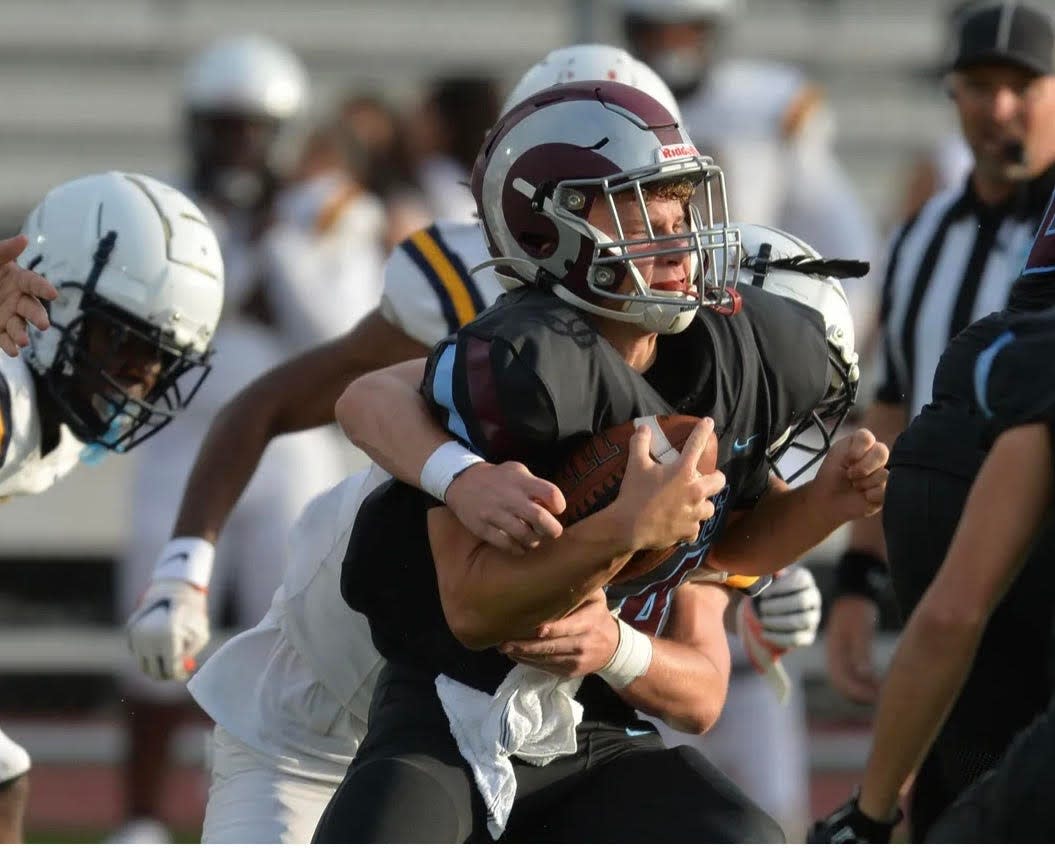 Riverview's Anthony Miller takes a hit during the Rams' spring game against Lehigh.