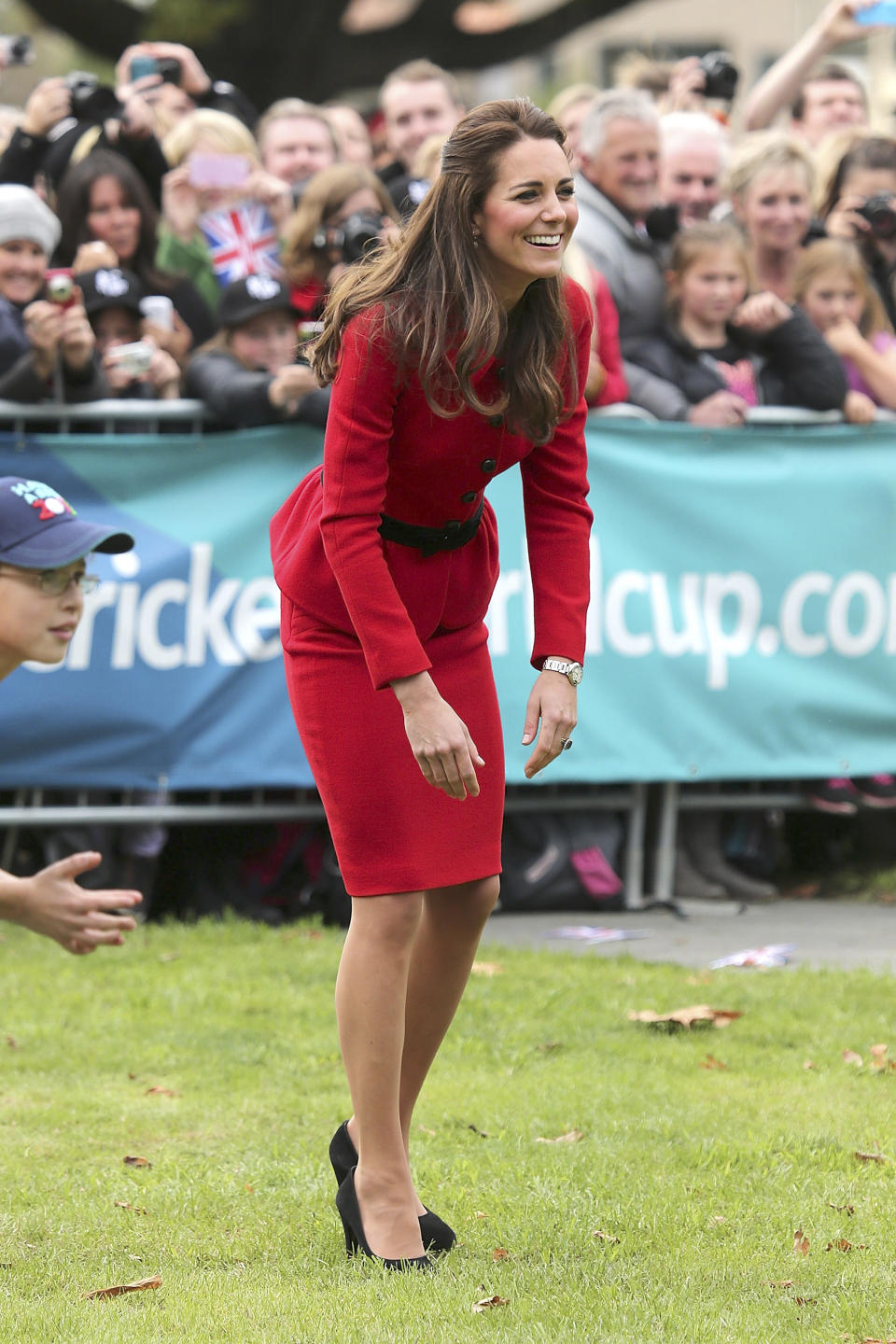 Britain's Kate, the Duchess of Cambridge, smiles while playing cricket in Latimer Square in Christchurch, New Zealand, Monday, April 14, 2014. Prince William and his wife Kate are on a three-week tour of New Zealand and Australia with their son, Prince George. (AP Photo/Martin Hunter, Pool)