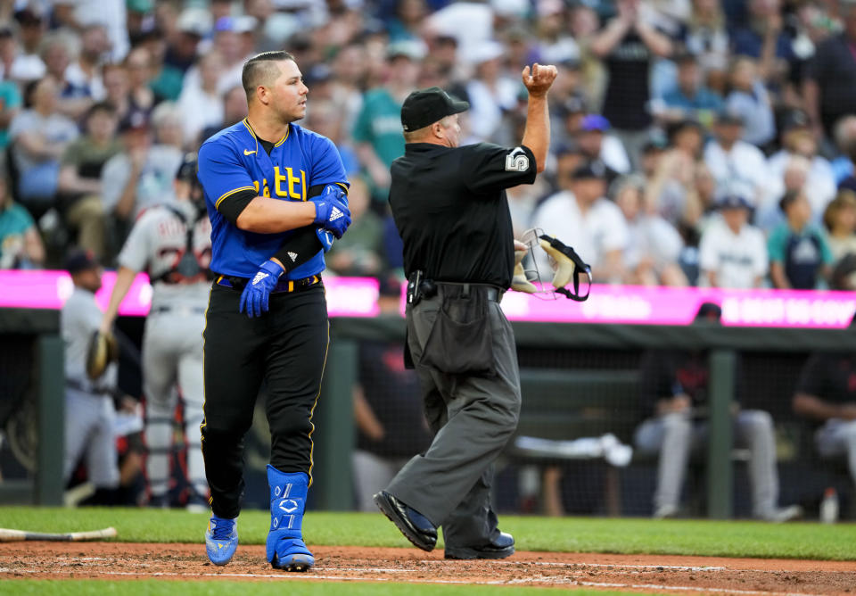 Home plate umpire Marvin Hudson ejects Seattle Mariners' Ty France after he argued a strike call during the fifth inning of the team's baseball game against the Detroit Tigers on Friday, July 14, 2023, in Seattle. (AP Photo/Lindsey Wasson)