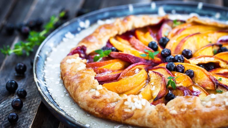 Rough pastry with sliced peach