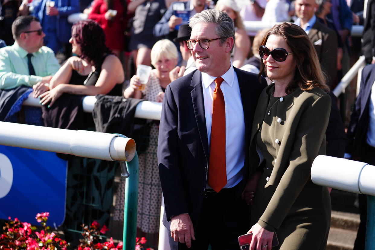 Prime Minister of the United Kingdom Keir Starmer (left) and wife Victoria Starmer enter the parade ring on day three of the Betfred St Leger Festival at Doncaster Racecourse. Picture date: Saturday September 14, 2024. (Photo by Mike Egerton/PA Images via Getty Images)