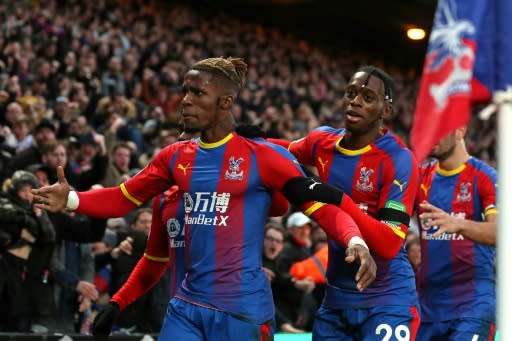 Aaron Wan-Bissaka's talent was spotted in defending Wilfried Zaha (left) in training