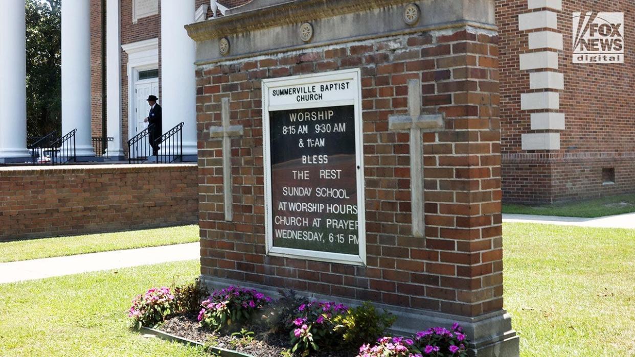 People attend a funeral a church for Johnny Wactor