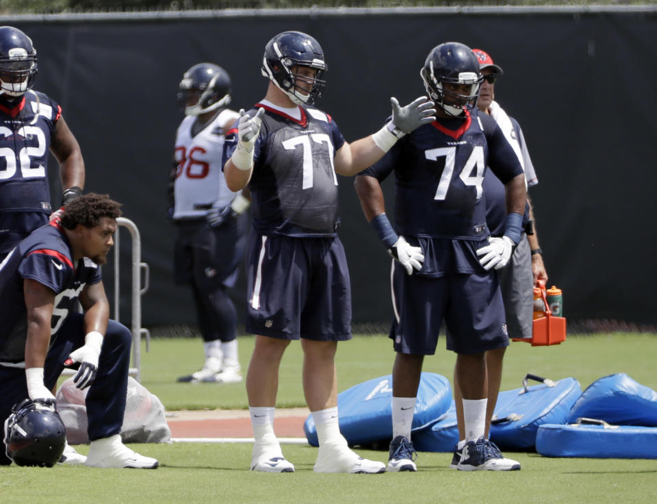 Houston Texans tackle David Quessenberry (C) has been promoted to the team’s 53-man roster, over three years after he was diagnosed with cancer. (AP)