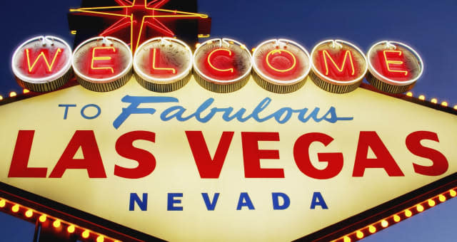 Neon 'Welcome to Las Vegas' 0sign at dusk, low angle view