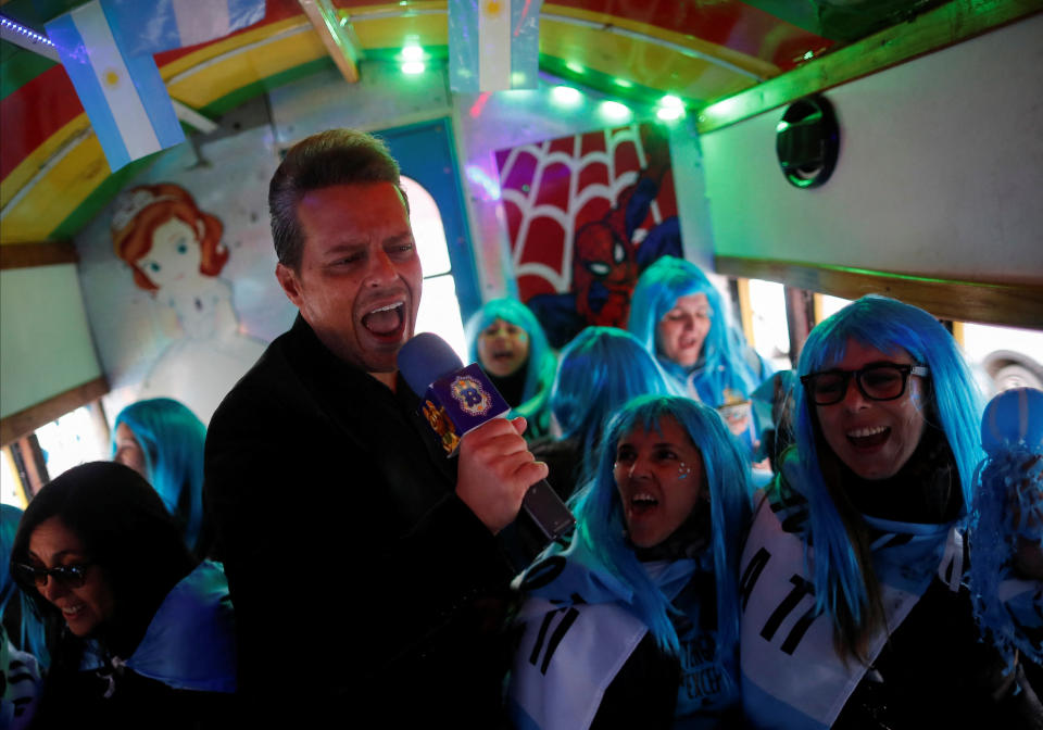 Argentine impersonator of Mexican singer Luis Miguel, Guillermo Elias, 50, sings with members of Miguel's fan club as they travel in a joy train (a modified bus) to the stadium where the singer will perform tonight, in Buenos Aires, Argentina August 3, 2023. REUTERS/Agustin Marcarian