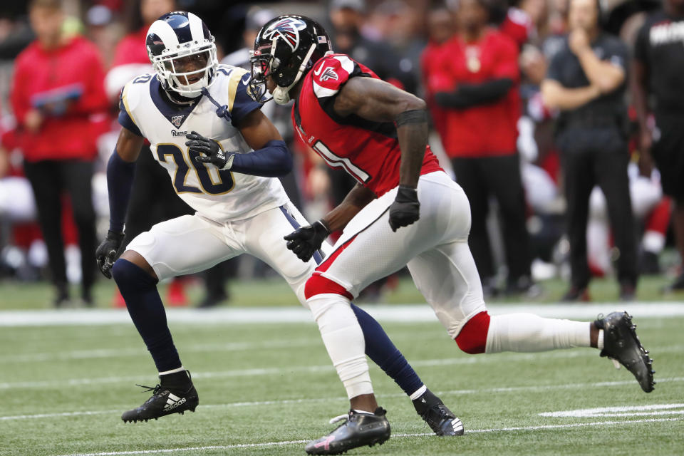 Los Angeles Rams cornerback Jalen Ramsey (20) covers Atlanta Falcons wide receiver Julio Jones (11) during the first half of an NFL football game, Sunday, Oct. 20, 2019, in Atlanta. (AP Photo/John Bazemore)