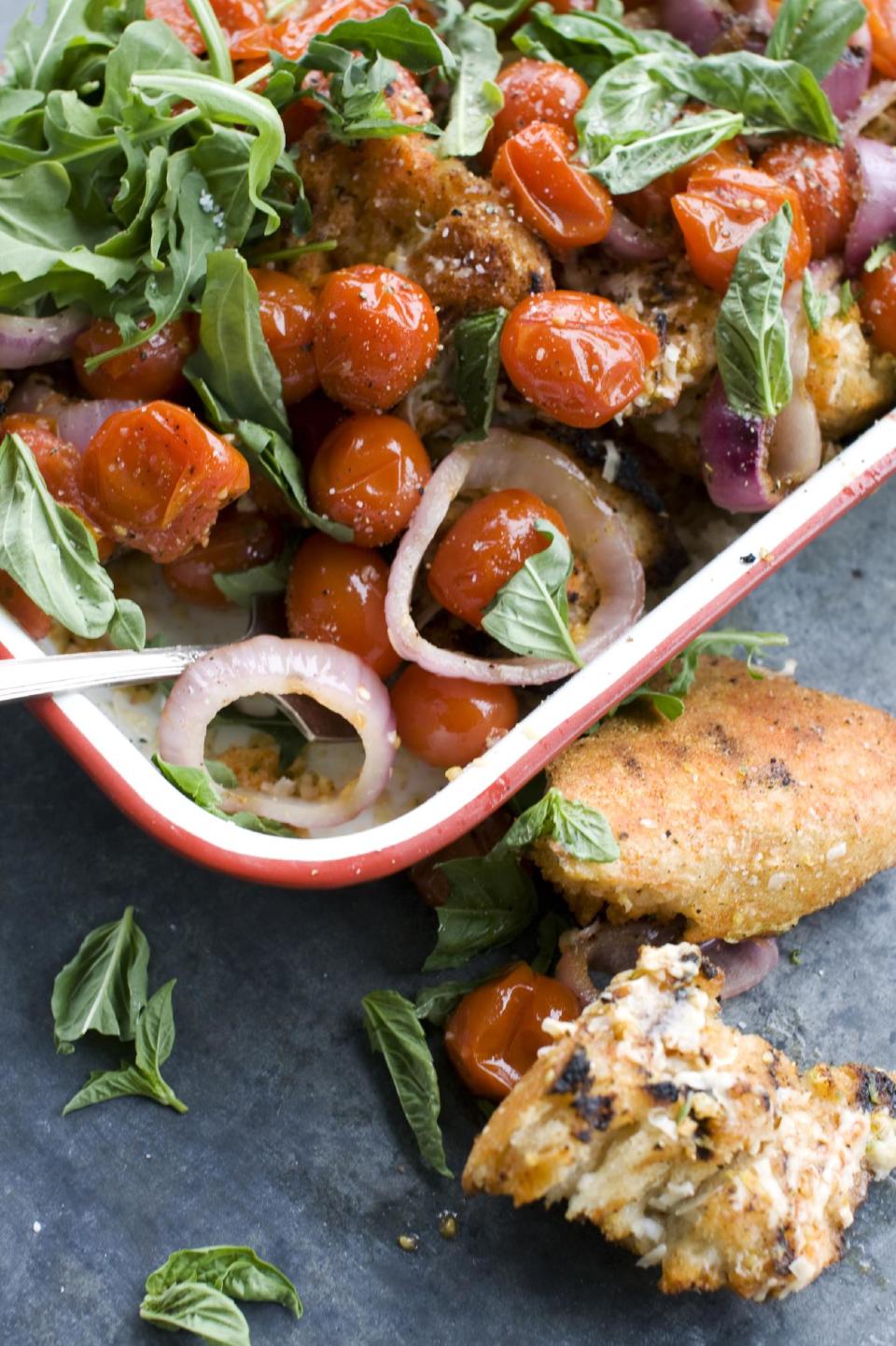 In this image taken on June 10, 2013, a grilled bread and tomato salad is shown in Concord, N.H. (AP Photo/Matthew Mead)