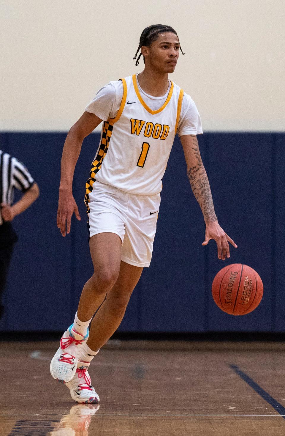 Archbishop Wood's Jalil Bethea (1) handles the ball in a District 12 playoff win over Northeast.