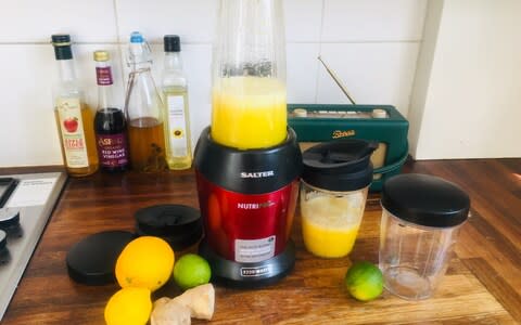 preparing juice in a bullet blender