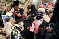 <p>People displaced from the Red Sea port city of Hodeidah sit at a shelter in Sanaa, Yemen July 18, 2018. (Photo: Khaled Abdullah/Reuters) </p>