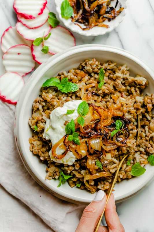 <p>Feel Good Foodie</p><p>Mujadara is a Middle Eastern lentil and rice recipe made with caramelized onions. You only need three ingredients to make this simple vegan, protein-rich meal.</p><p><strong>Get the recipe: <a href="https://feelgoodfoodie.net/recipe/mujadara/" rel="nofollow noopener" target="_blank" data-ylk="slk:Lebanese Mujadara;elm:context_link;itc:0;sec:content-canvas" class="link ">Lebanese Mujadara</a></strong></p>