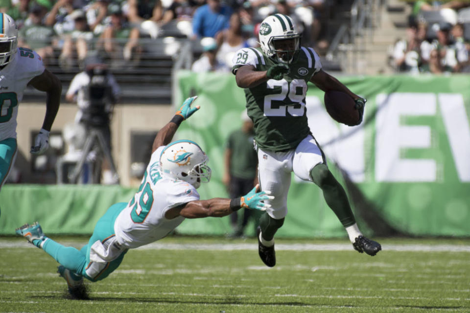 September 24, 2017; East Rutherford, NJ, USA; New York Jets running back Bilal Powell (29) runs the football against Miami Dolphins strong safety Nate Allen (29) during the second quarter at MetLife Stadium. Mandatory Credit: Kyle Terada-USA TODAY Sports