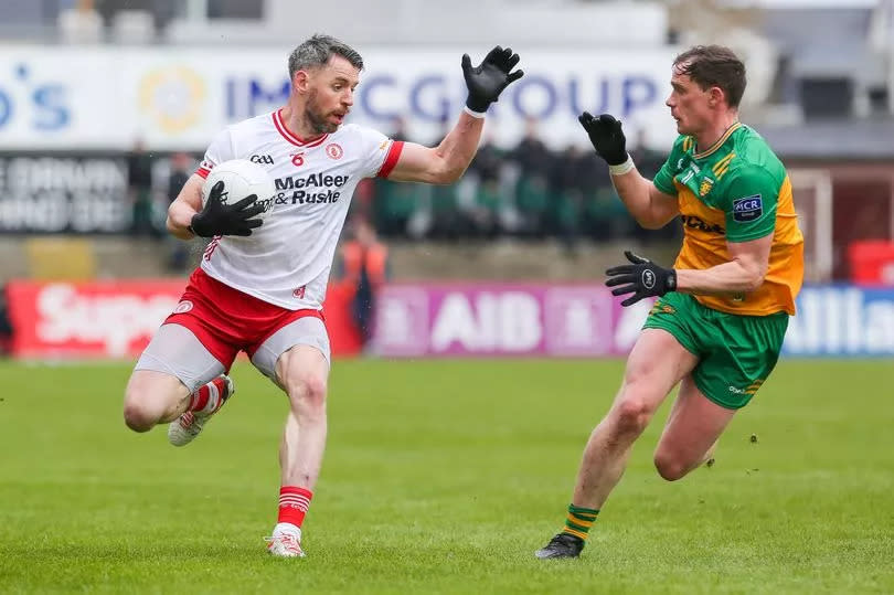 Tyrone's Mattie Donnelly in action against Donegal's Ciaran Thompson