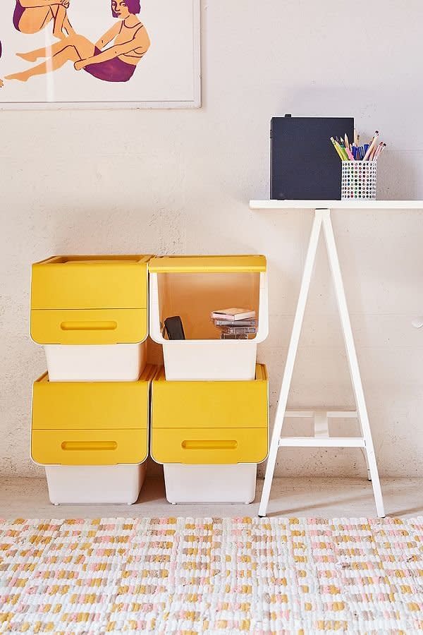 <a href="https://www.urbanoutfitters.com/shop/stackable-storage-box-set?category=furniture&amp;color=074" target="_blank">Not only is this a steal at $50</a>, these lidded prop-open top containers can be used together or separately to store everything from make-up and beauty products to electronics, stationary, desk supplies and more.