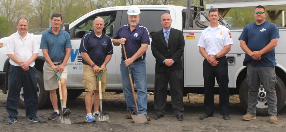 Ground was broken for the new track in Rootstown&#x002019;s Robert C. Dunn stadium on April 28 with completion expected by August 2021. Getting ready for the start of the project are, from left, Athletic Director Keith Waesch, boys track coach Larry Bailey, girls track coach Kyle Rodstrom, Foundation president Denny Pickens, Superintendent Andrew Hawkins, Board of Education president Craig Mullaly and sports boosters president Al Marzec.