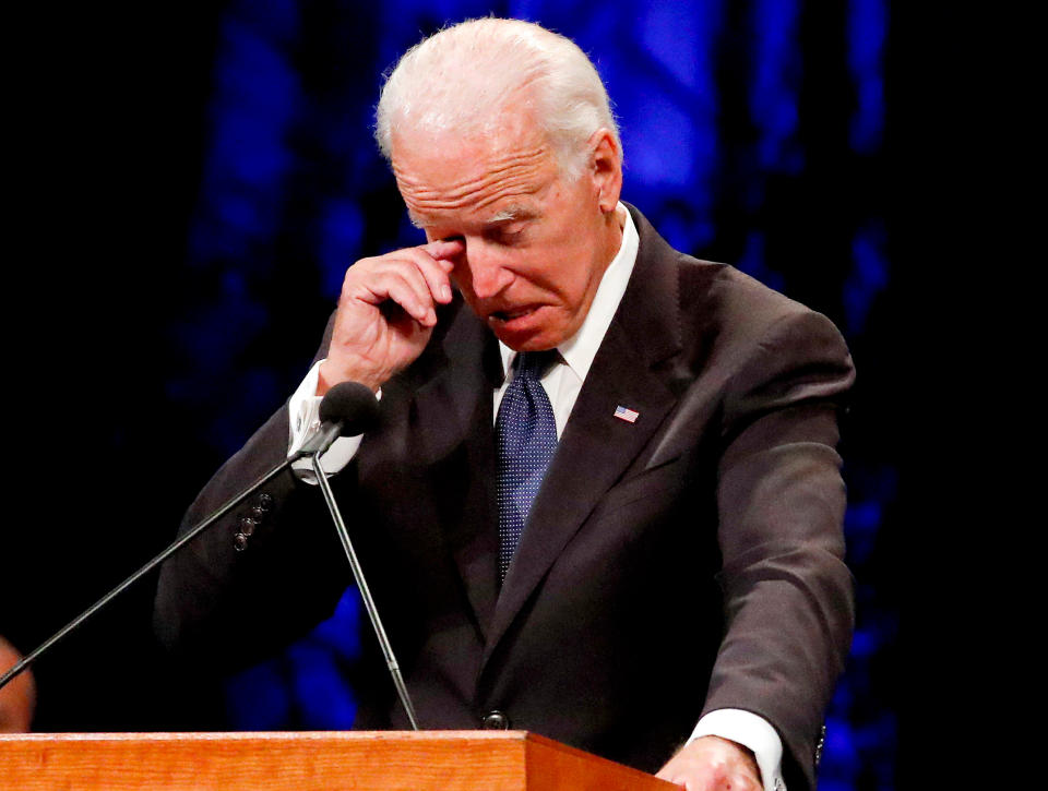 Former Vice President Joe Biden wipes a tear away while giving a tribute during memorial service at North Phoenix Baptist Church for Sen. John McCain on Aug. 30, 2018.