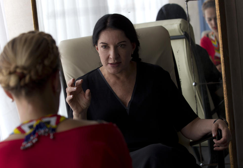 Performance artist Marina Abramovic speaks during an interview at the Rio Film Festival in Rio de Janeiro, Brazil, Thursday, Oct. 4, 2012. The Belgrade-born artist is best known for her piece "The Artist Is Present," which in 2010 saw her sit silent and motionless for 736.5 hours opposite a parade of strangers at New York's Museum of Modern Art. The film is playing at the 2012 Rio de Janeiro International Film Festival. (AP Photo/Silvia Izquierdo)